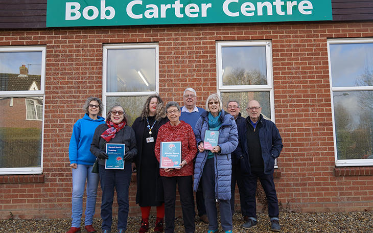 Volunteers who have trained to become Welbeing Champions outside the Bob Carter Centre in Drayton