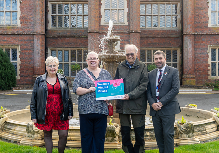 Lisa Overton-Neal, Kate Leggett and Graham Minshull with a Wellbeing Champion from Framingham Earl at Dunston Hall.