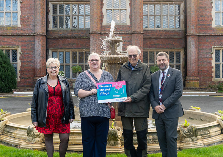 Lisa Overton-Neal, Kate Leggett and Graham Minshull with a Wellbeing Champion from Framingham Earl at Dunston Hall.