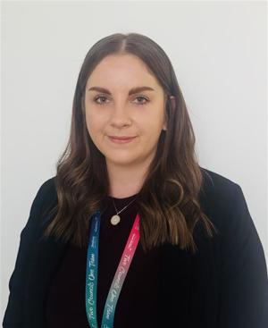 Photo of a woman in a black blouse