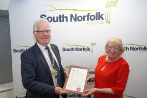 James Easter presenting new honorary alderman
