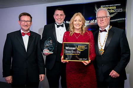 Church Farm Shop accepting their South Norfolk Retailer of the Year award
