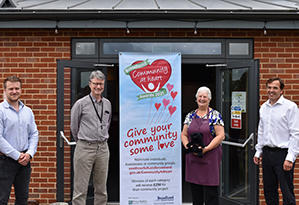 Cllr Shaun Vincent (right) with Angela from Hug a Mug and John Warren and Matt Hector from Price Bailey