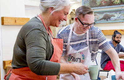 A man and woman laughing together