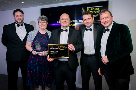 Group Lotus accepting the Employer of the Year award
