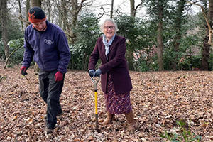 Cllr Judy Leggett with a volunteer from the Norwich Fringe Project at Spring Plantation in Taverham