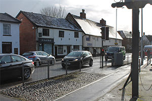 Cars going down Long Stratton high street