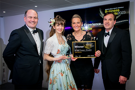 ROARR! Dinosaur Adventure accepting their Visitor Experience award