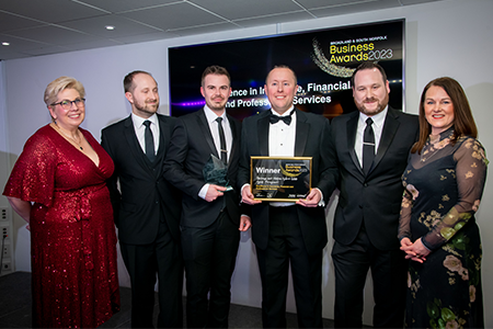 Starkings and Watson Hybrid Estate Agents Poringland accepting their Excellence in Insurance, Financial and Professional Services award