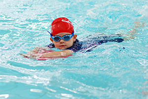 Young boy swimming