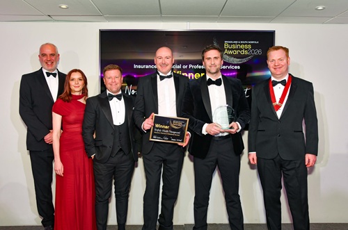 Norfolk Wealth Management accepting the Insurance, Financial or Professional Services Award