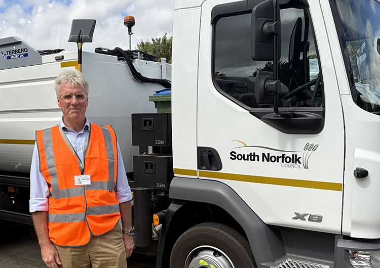 Cllr Martyn Hooton and food waste lorry