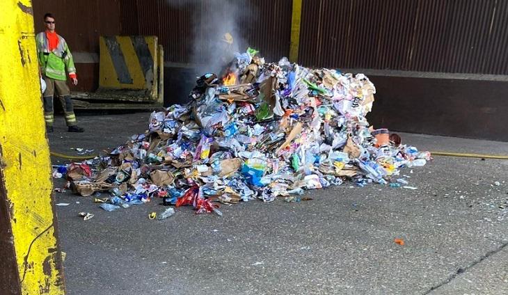 Pile of rubbish from a bin lorry on fire
