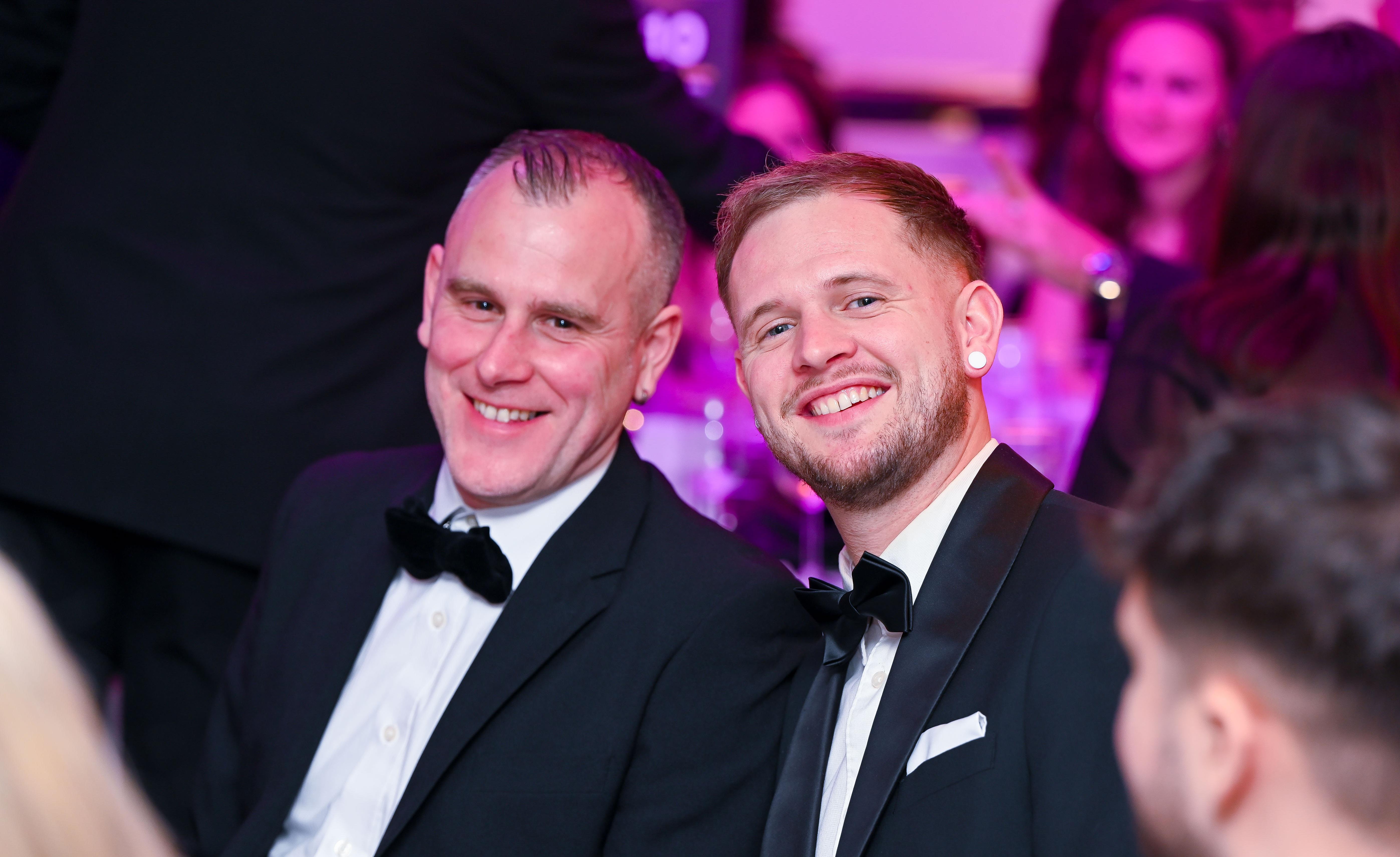Two male guests smiling at the 2026 Business Awards