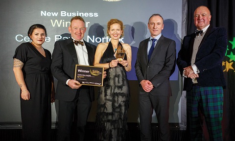 Centre paws accepting their trophy and certificate for the new business award