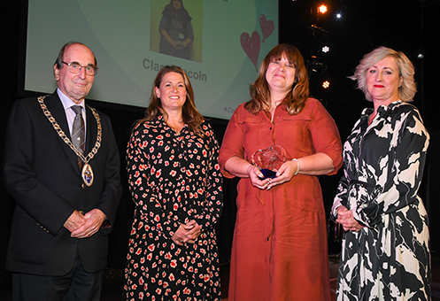 Clare Lincoln receiving Inspiration of the Year with Chairman Cllr Roger Foulger and Clarion Housing