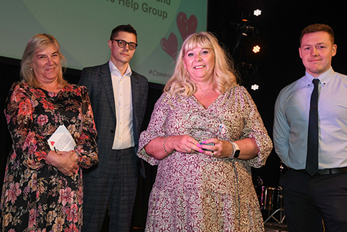 Thorpe Marriott, Taverham and Drayton Covid-19 Help Group received Community group of the year from Cllr Sue Lawn and representatives from East of England Coop