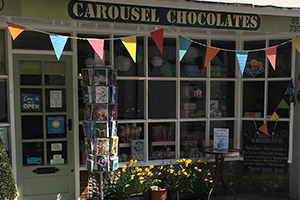 Carousel chocolates shop in Aylsham with bunting outside